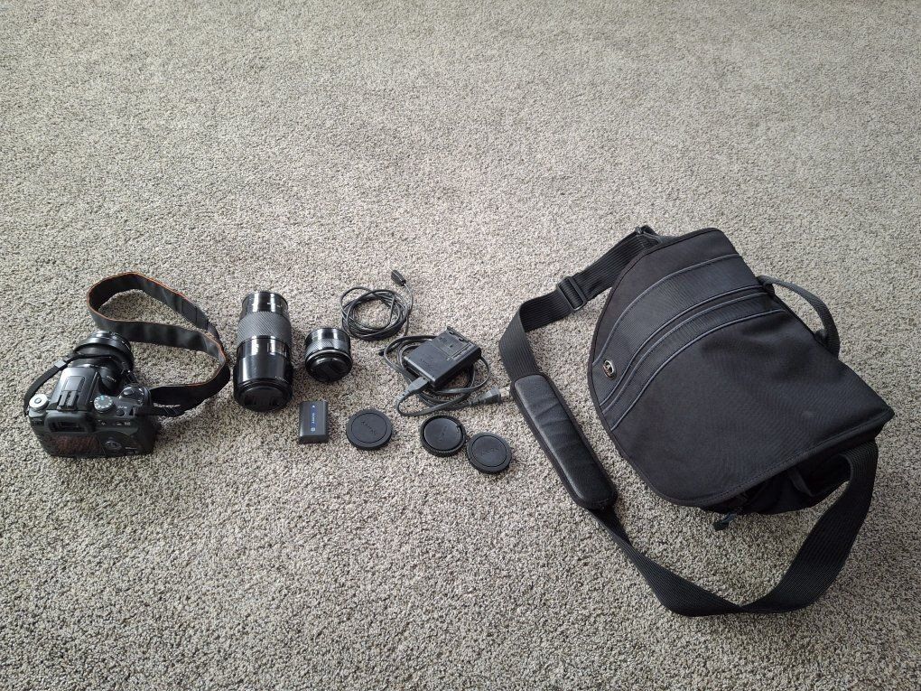 Sony  A100 DSLR Camera Bundle with Multiple Lenses, Camera bag, Battery, Charger, and Accessories