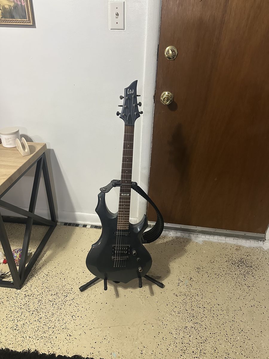 LTD electric guitar 40 amp, and pedal board