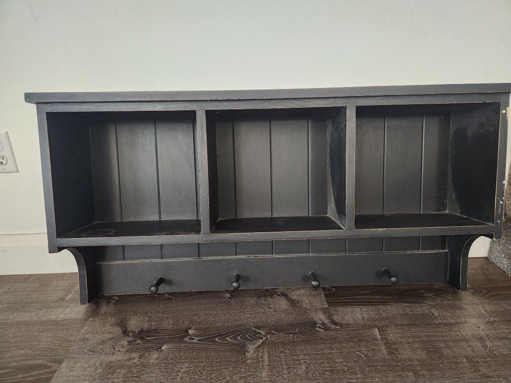 Black cube shelves with hooks