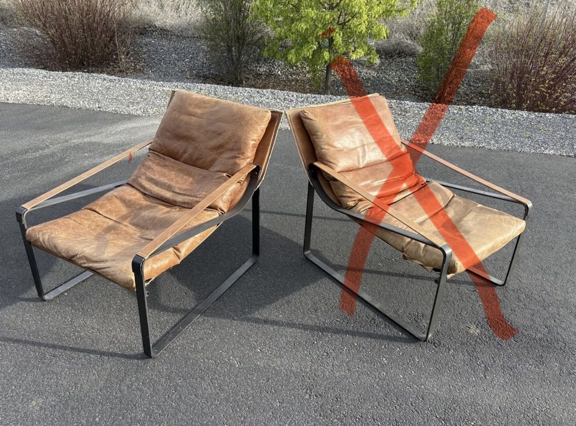 Beautiful genuine leather accent chair.  Down filled cushions. Orig over $1,400 each new  Great for Mid Century Modern MCM