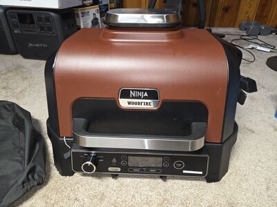 Used once, 4 in 1 Ninja Woodfire grill, smoker, air fryer, roaster