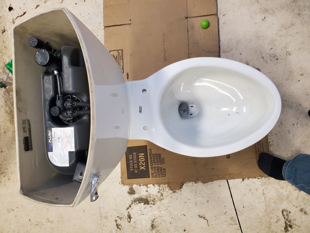 New American Standard power assisted flush toilet