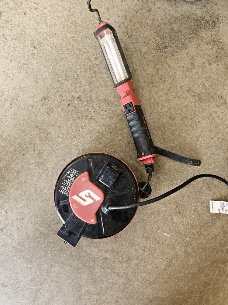 Snap-on Retractable Cord Reel Work Light with Built-in Outlet