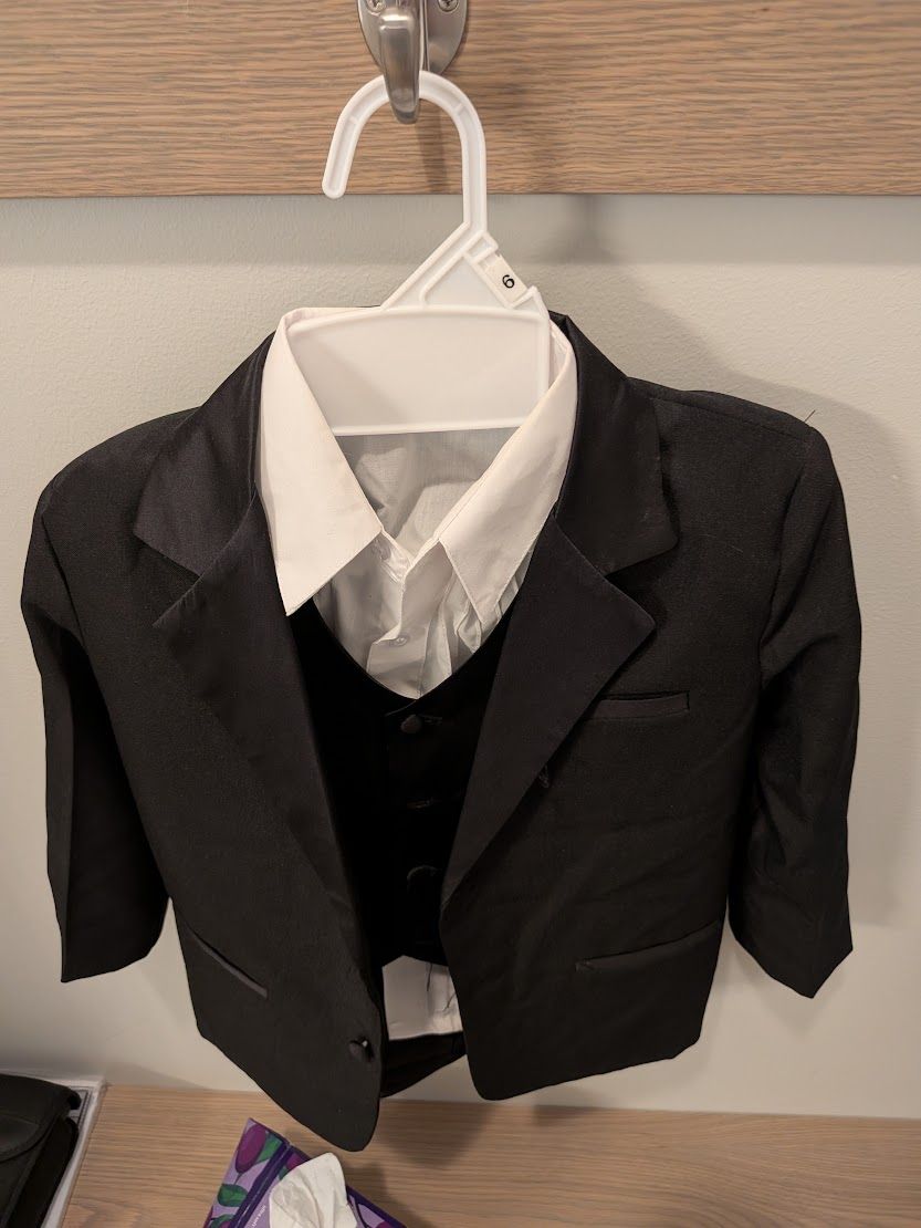 Young Size 6 Suit, Pants, Vest, and Blue bowtie.