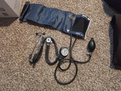 blood pressure cuff and stethoscope