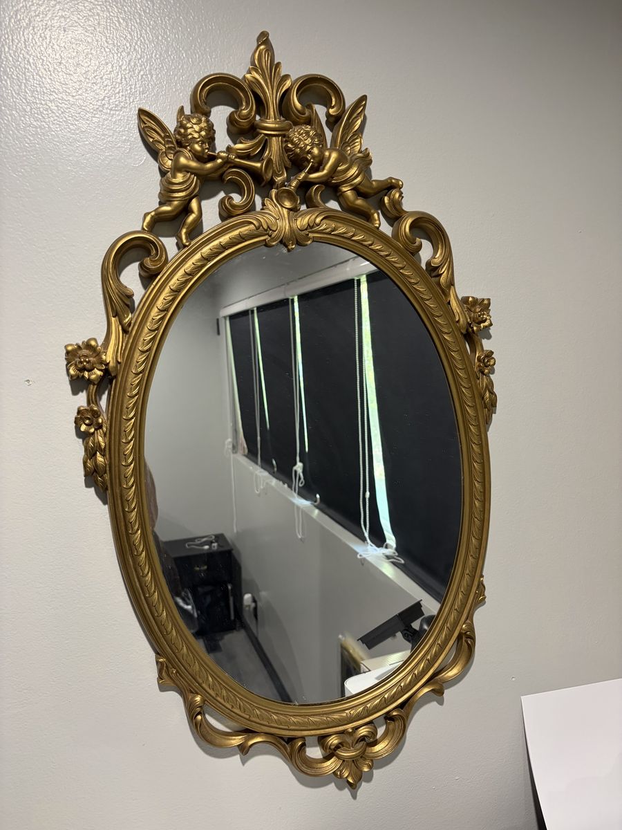 Vintage mid century Hollywood style oval wall mirror