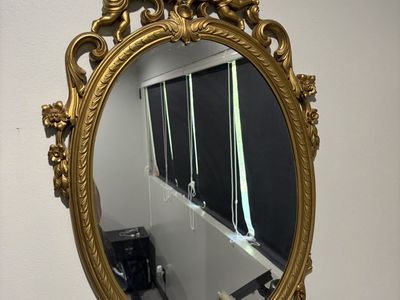 Vintage mid century Hollywood style oval wall mirror