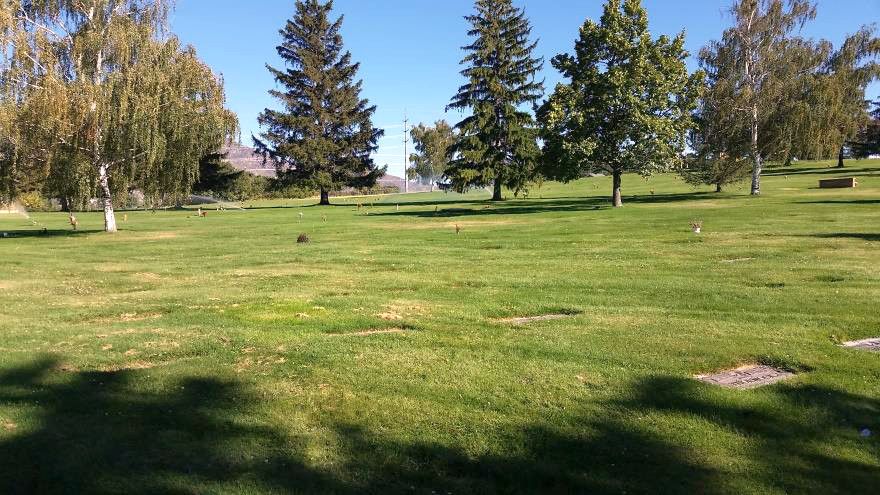 Two side-by-side cemetery plots in Washington Heights Memorial Park, Ogden, Utah