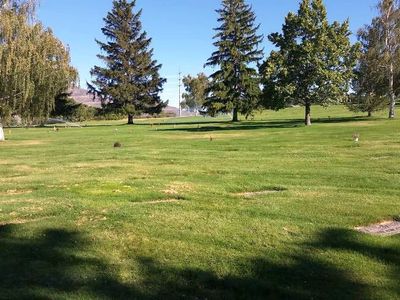 Two side-by-side cemetery plots in Washington Heights Memorial Park, Ogden, Utah