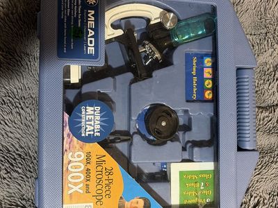 MEADE 28-Piece Microscope Set - 100X to 900X Magnification, Durable Metal Construction