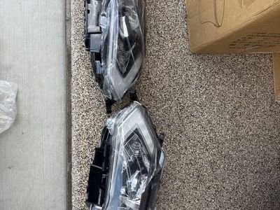 Brand new nissan rogue headlights