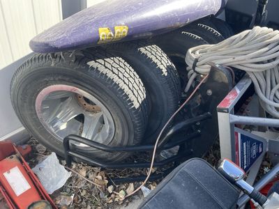 2008 Chevy 3500 Truck Rims and Tires with 50% Tread, Hub Caps & Lug Nuts Included