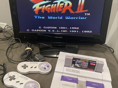 Super Nintendo SNES Console Bundle OEM with 2 Controllers, all the necessary cables and Street Fighter II