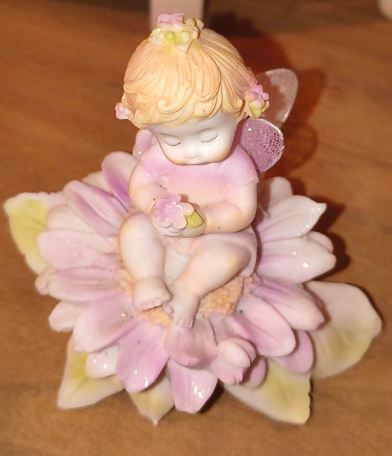 Ceramic Fairy Figurine Sitting on Pink Flower with Mesh Wings