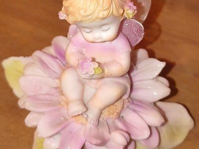 Ceramic Fairy Figurine Sitting on Pink Flower with Mesh Wings