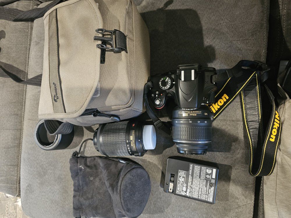 Nikon DSLR Camera Bundle with 18-55mm & 55-200mm Lenses, Charger, extra battery & Lowepro Bag