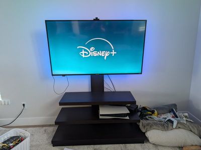 55" TV with Integrated 3-Tier Entertainment Stand and Mount