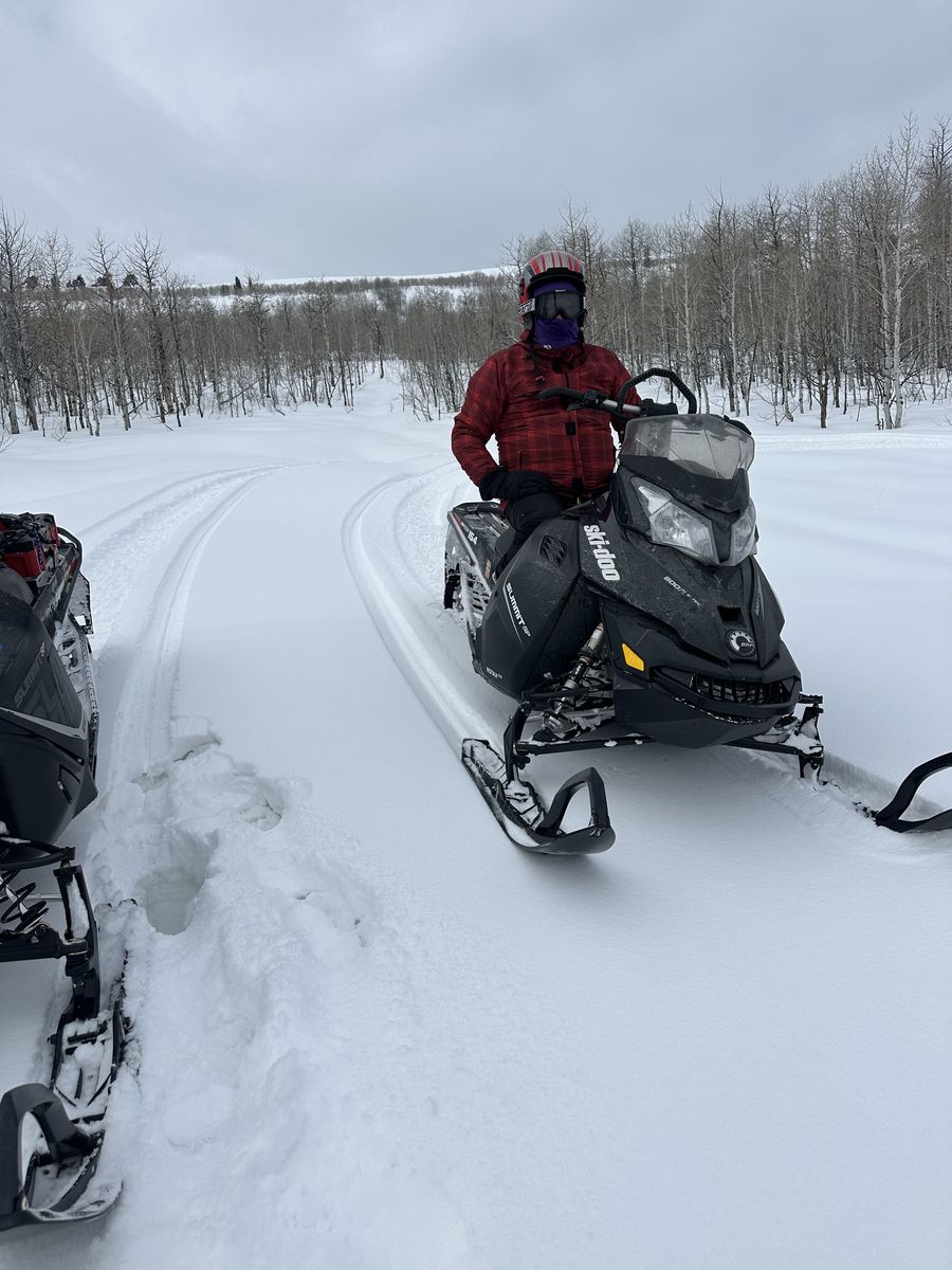 2014 and 2018 Snowmobiles and trailer