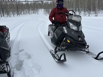 2014 and 2018 Snowmobiles and trailer