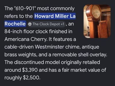 Howard Miller La Rochelle 610-901 84-inch Americana Cherry Grandfather Clock w/ Westminster Chime.