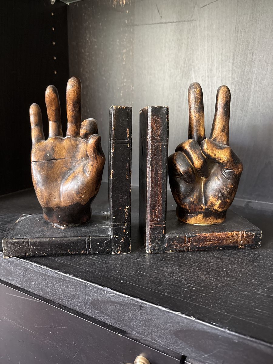 Bookends, hands
