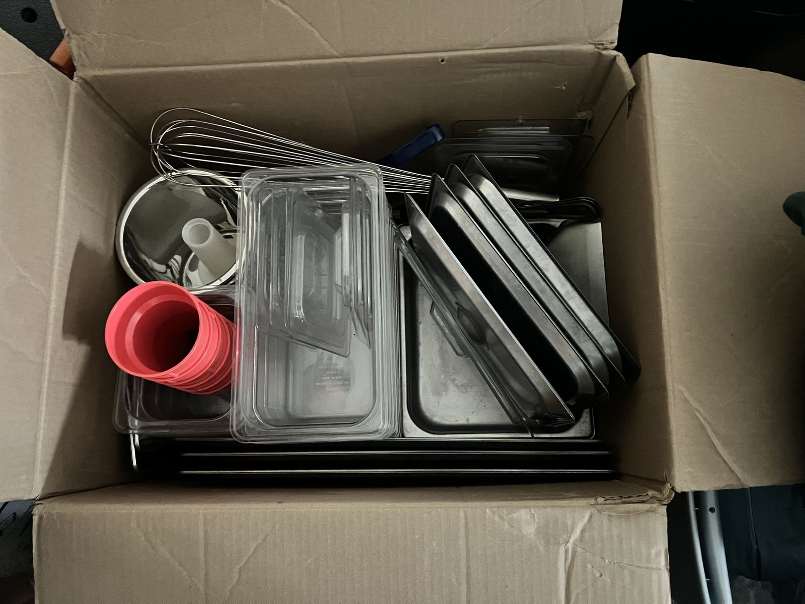 Assorted Commercial Kitchen Supplies: Stainless Steel Pans, Clear Lids, Whisks, and More