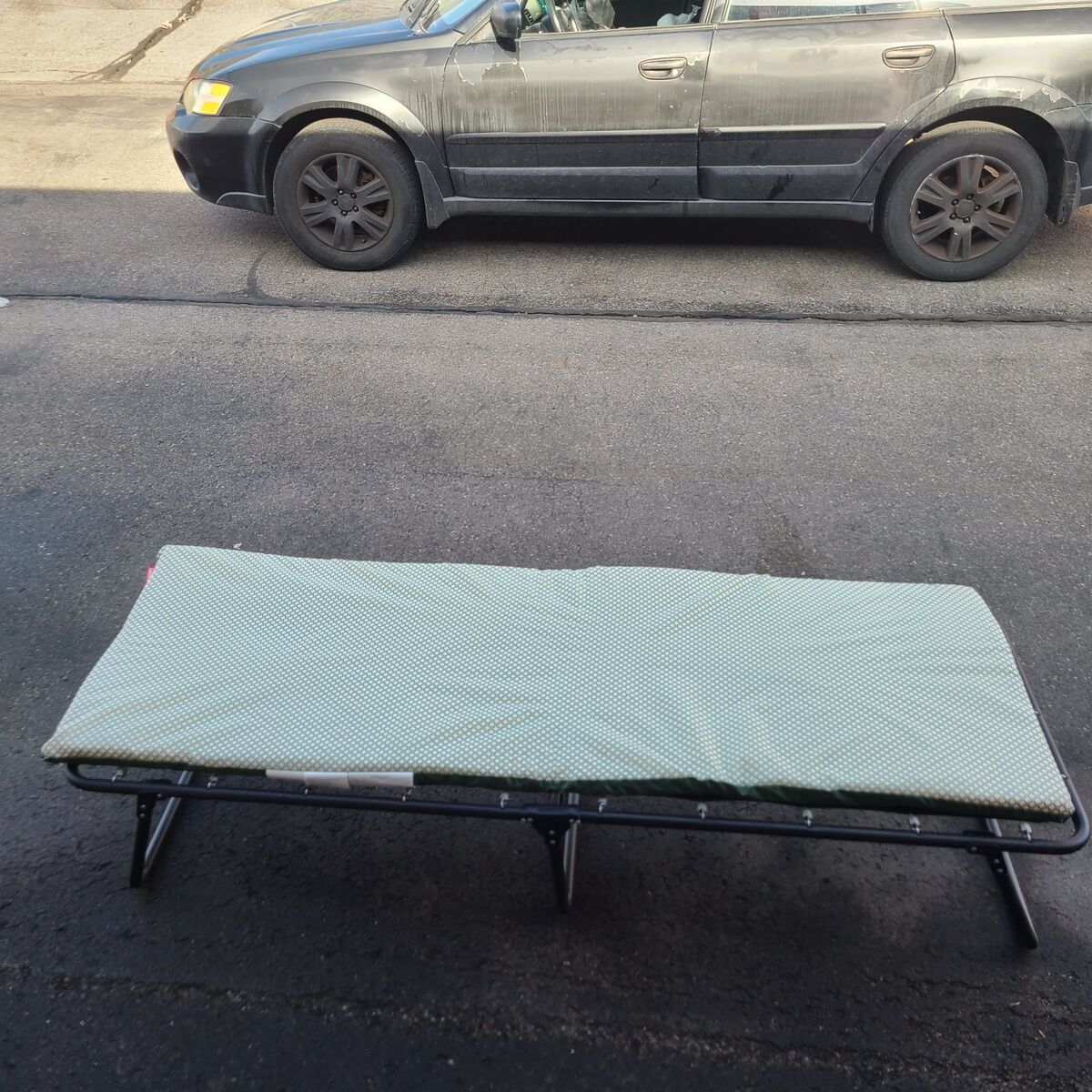 Coleman camping cot with pad