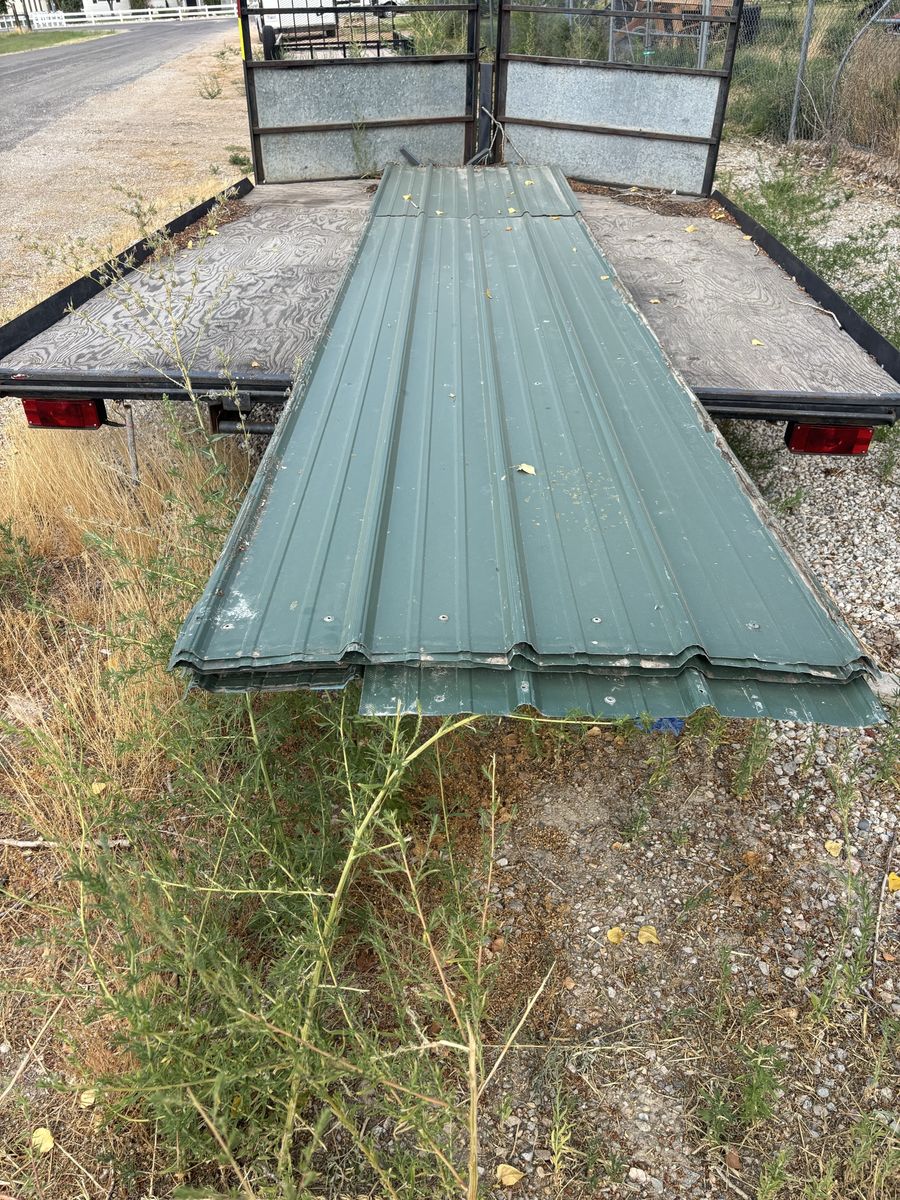 Used Green Corrugated Metal Roofing Panels Stack