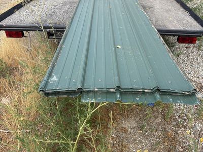 Used Green Corrugated Metal Roofing Panels Stack