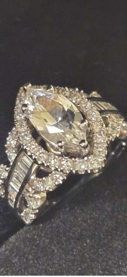 Marquise Cut Halo Diamond Engagement Ring with Baguette and Round Accent Stones