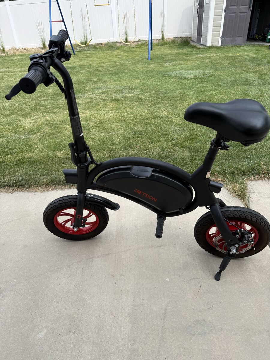 Jetson Bolt Folding Electric Ride-On Bike, Black with Red Wheels