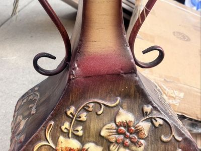 Decorative Metal Urn Vase with Embossed Floral Design and Artificial Botanical Arrangement