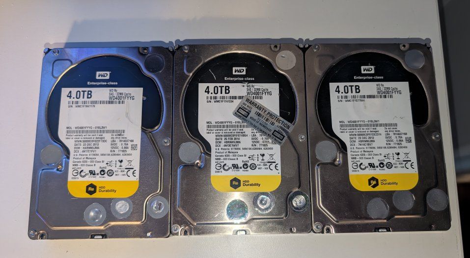 Lot of 3 WD Re 4.0TB Enterprise-Class SAS Hard Drives WD4001FYYG