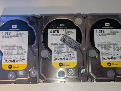 Lot of 3 WD Re 4.0TB Enterprise-Class SAS Hard Drives WD4001FYYG