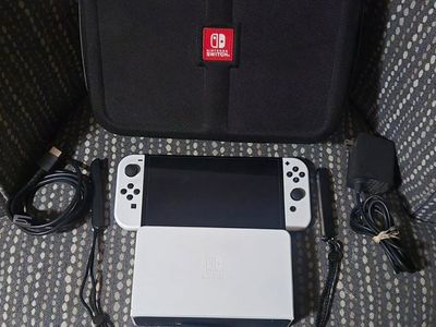 Nintendo Switch Oled with travel case and tv dock! trades considered~!