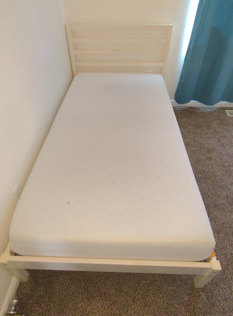 IKEA Tarva twin pine bed frame with mattress