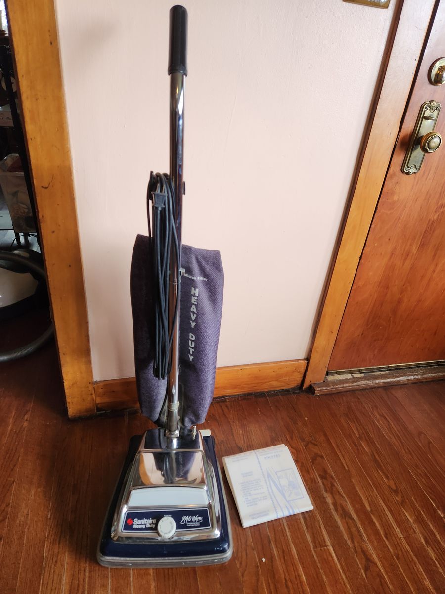 Sanitaire Heavy Duty bagged vacuum, new bag and belt and an extra bag.  Works great, super clean.