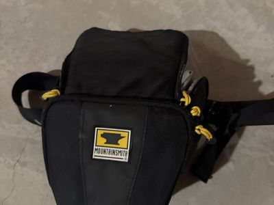 Mountainsmith Black Outdoor Camera Bag Pack with Yellow Zipper Pulls