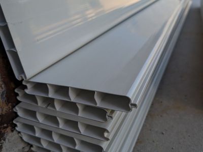 7 brand new vinyl fence panel pieces left over from our project