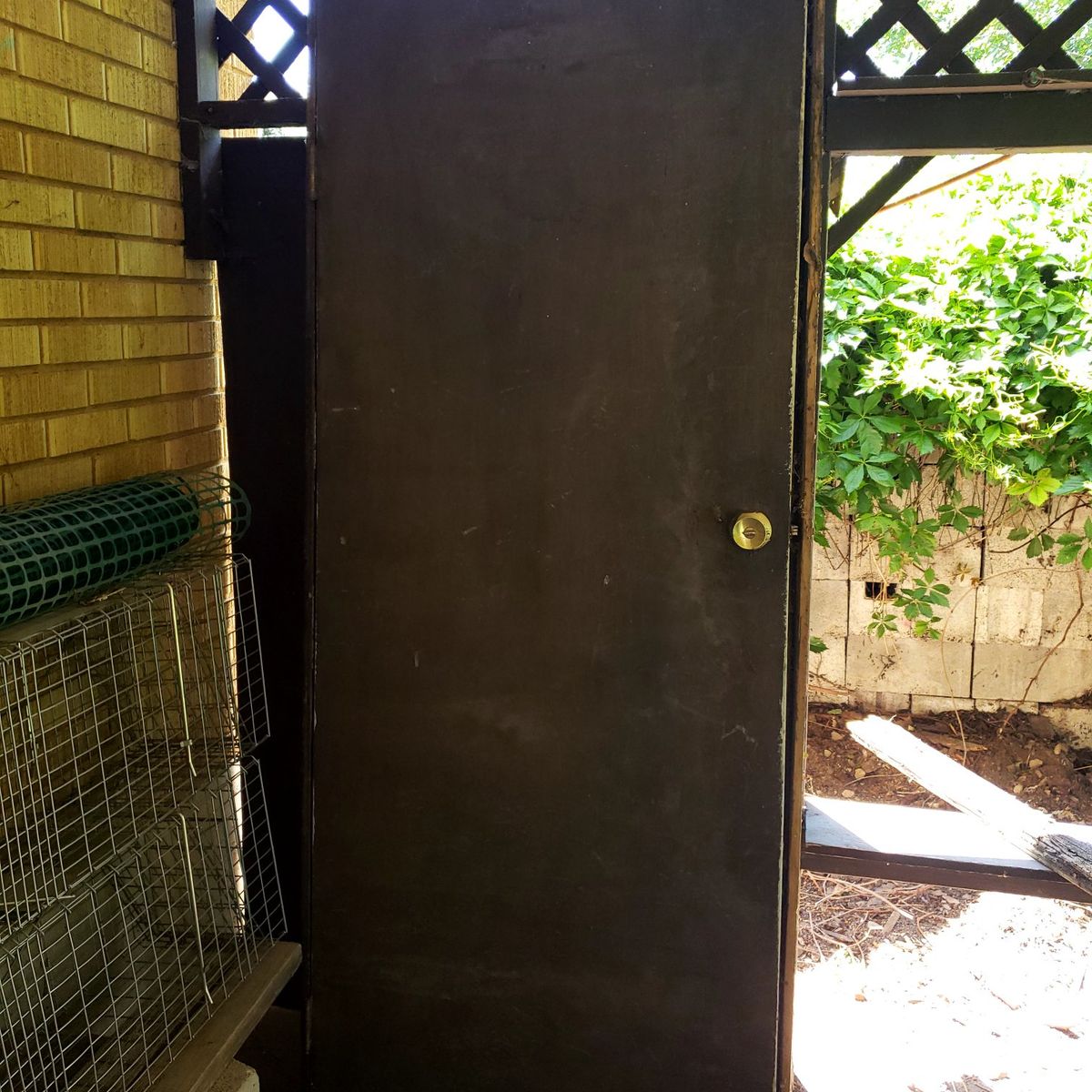 Outside door with frame and door knob