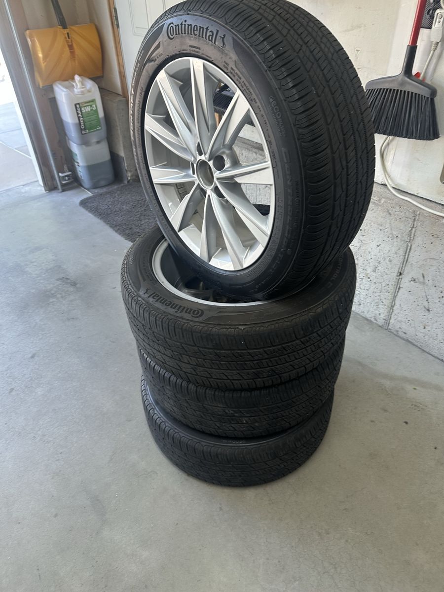 Continental ProContact TX 215/55 R17Tires & Wheels - Set of 4 Fits on VW . Bolt pattern is 5x112mm
