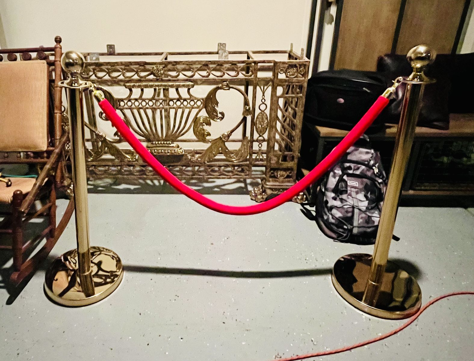 2 STACHIONS AND 1 VELVET RED ROPE