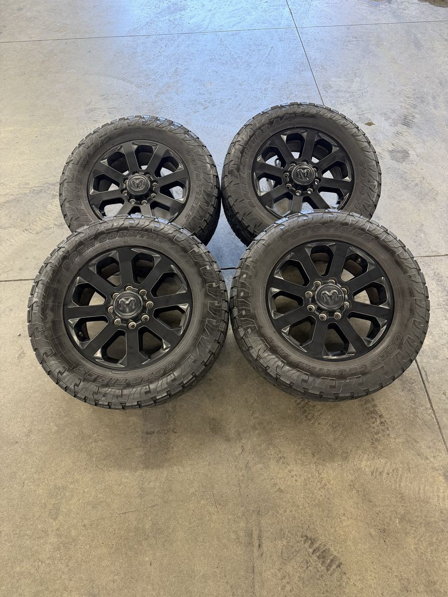 2024 ram 3500 OEM 20in midnight wheels/ 285/65/20 Toyos