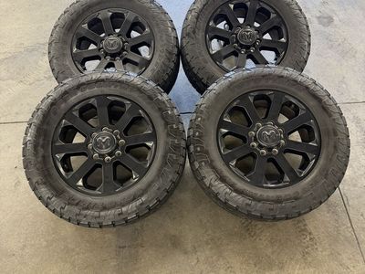 2024 ram 3500 OEM 20in midnight wheels/ 285/65/20 Toyos