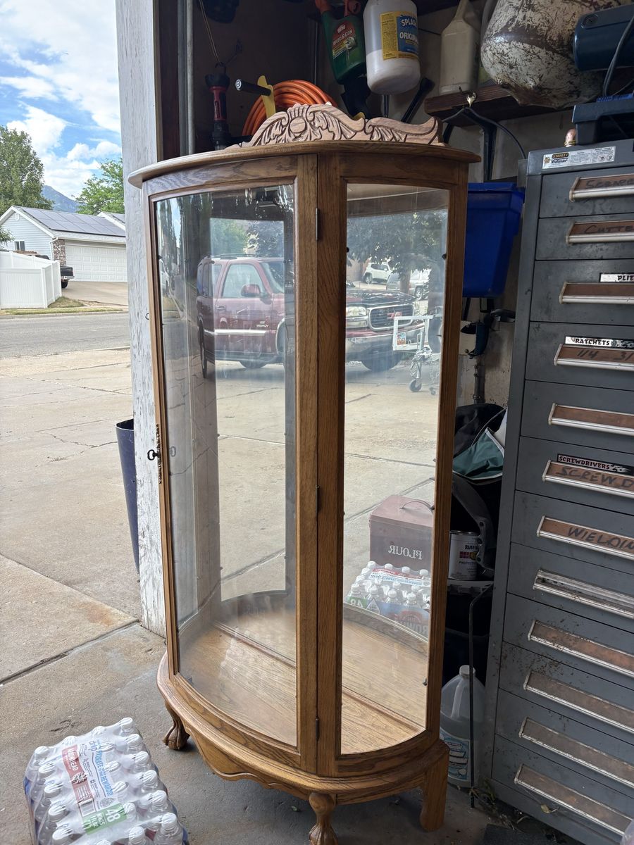 Vintage Oak Wood Curio Display Cabinet with Glass Doors - Elegant Carved Top Accent