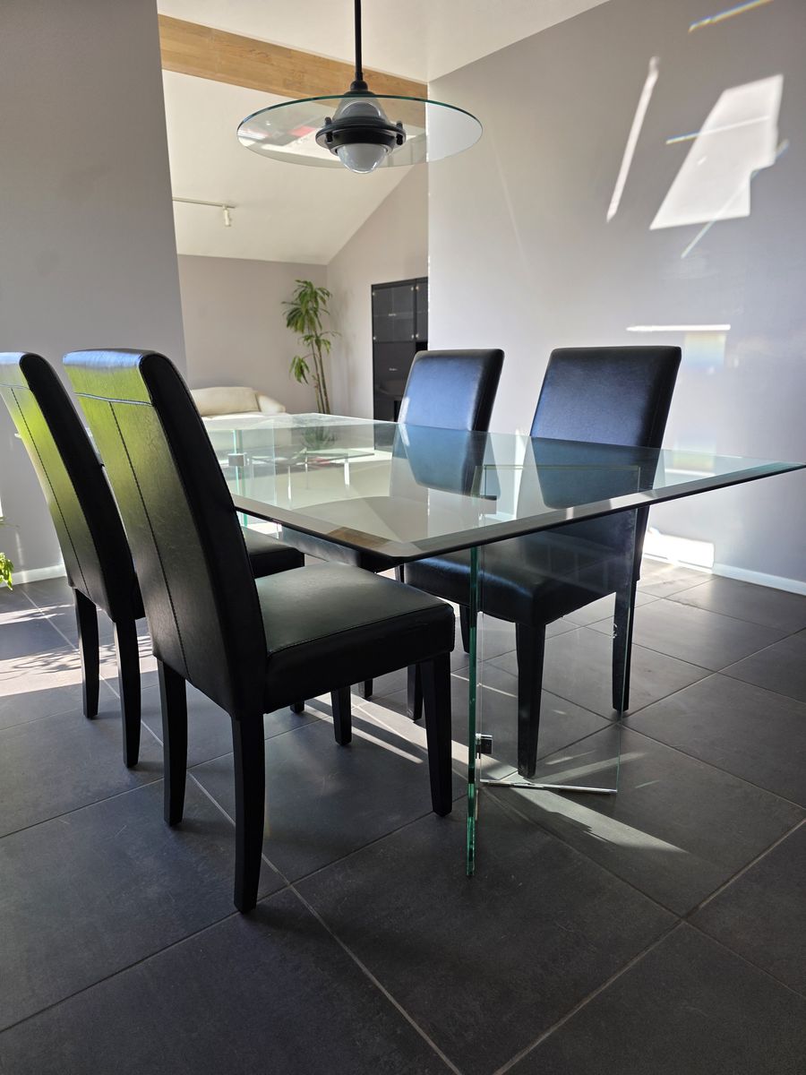 Glass Dining Room Table with Four Leather Chairs