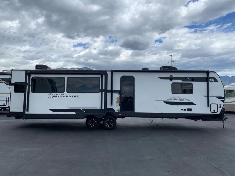 New 2025 Forest River RV Grand Surveyor Luxury Rear Living Travel Trailer with Triple Slides (305RLBS)