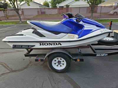 2 WAVERUNNERS WITH TRAILER