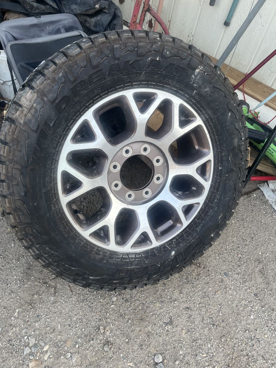 Falken Wildpeak A/T3W LT285/65R20 Tire on 8-Lug Alloy Wheel
