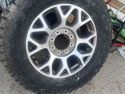 Falken Wildpeak A/T3W LT285/65R20 Tire on 8-Lug Alloy Wheel